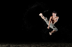 Kung Fu jump kick on a beach in Long Hai, Vietnam