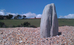 iPhone photo - a rock on a pebble beach